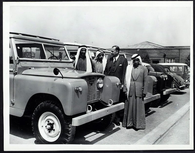 Sheikh Rashid, Ruler of Dubai, looks at a Land Rover on a trip to the UK in June, 1959. Crown Copyright Images 