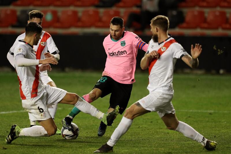 Lionel Messi played a role in both goals for Barcelona in their win over Rayo Vallecano. EPA