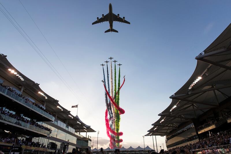 Abu Dhabi, United Arab Emirates, November 26, 2017:    Etihad Airways and Al Fursan flyover during the Abu Dhabi Formula One Grand Prix at Yas Marina Circuit in Abu Dhabi on November 26, 2017. Christopher Pike / The National

Reporter: John McAuley, Graham Caygill
Section: Sport