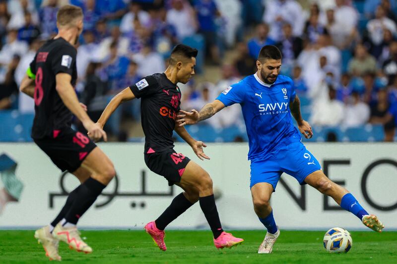 Aleksandar Mitrovic, right, scored a hat-trick in Al Hilal's 6-0 Asian Champions League win over Mumbai City. Photo: @Alhilal / X. formerly Twitter