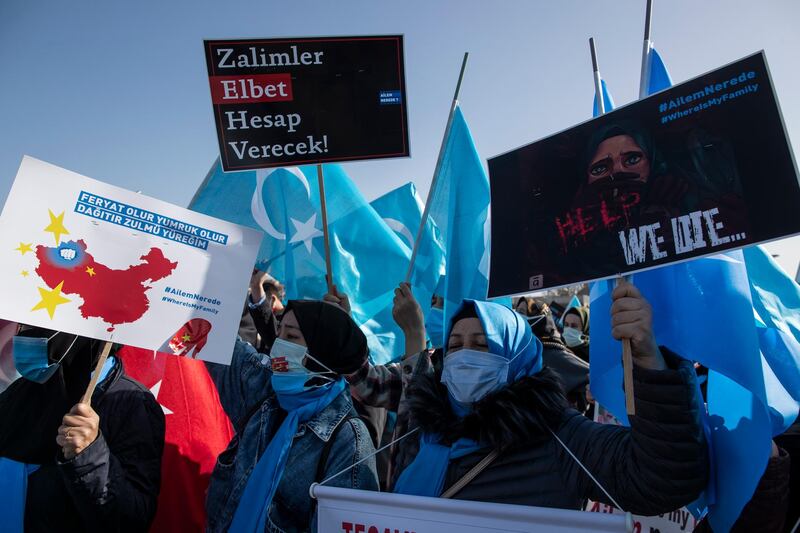 Uighur demonstrators protest against China's treatment of Uighurs and other minority groups in Xinjiang, at a demonstration in Istanbul, Turkey. EPA