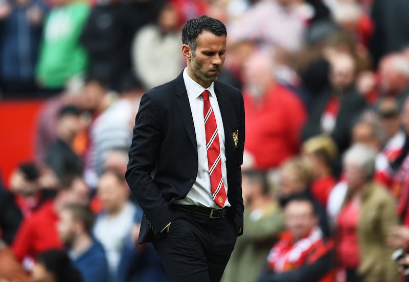Giggs, then Manchester United's interim manager, walks off the pitch following a loss at Old Trafford in May 2014. Getty Images