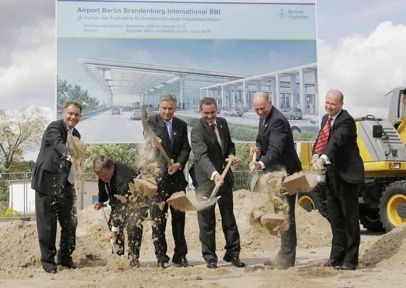 BERLIN - SEPTEMBER 05:  (L-R) Rainer Schwarz, Hartmut Mehdorn (Deutsche Bahn), Mayor of Berlin Klaus Wowereit, Brandenburg State Governor Matthias Platzeck, Transport Minister Wolfgang Tiefensee and Thomas Weyer (CEO of BBI) attend the ground-breaking ceremony at the new Berlin-Brandenburg International airport (BBI) at Schoenefeld on September 5, 2006 in Berlin, Germany.  Berlin is proposing to turn the former East Germany airport into a major hub by 2011.   (Photo by Andreas Rentz/Getty Images)