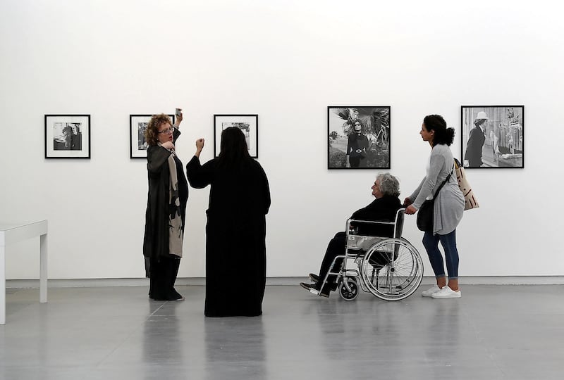 SHARJAH , UNITED ARAB EMIRATES , MARCH 15  – 2017 :- Visitors looking at the work of Latif Al Ani during the opening of the exhibition at Sharjah Art Foundation in Sharjah. ( Pawan Singh / The National ) For Arts & Life. Story by Melissa