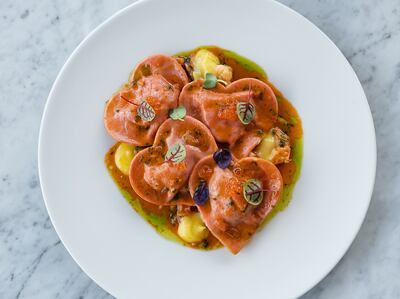 Heart-shaped beetroot ravioli stuffed with lobster and passion fruit at Bussola. Photo: Jumeirah Golf Estates