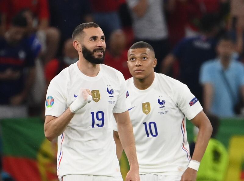 Soccer Football - Euro 2020 - Group F - Portugal v France - Puskas Arena, Budapest, Hungary - June 23, 2021 France's Karim Benzema celebrates scoring their second goal with Kylian Mbappe Pool via REUTERS/Franck Fife