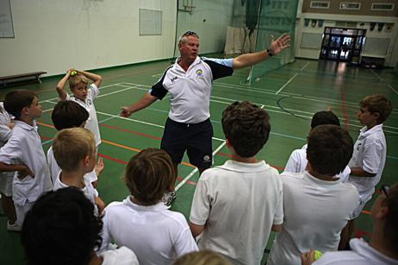 Colin Wells, the former UAE cricket coach, puts pupils at the British School Al Khubairat through their paces.
