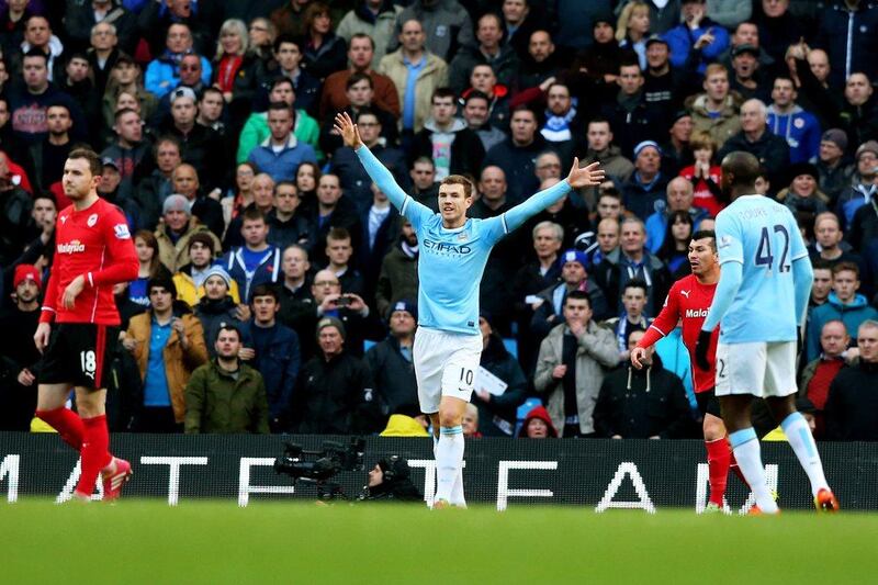 Edin Dzeko scored Manchester City's 100th goal of the Premier League season on Sunday. Alex Livesey / Getty Images