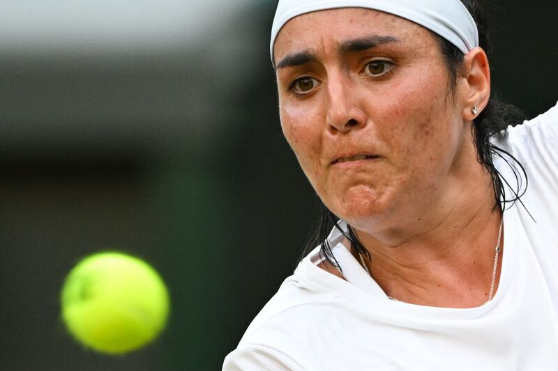 Tunisia's Ons Jabeur eyes the ball as she returns it to Belgium's Elise Mertens. AFP
