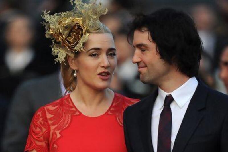 Kate Winslet and Ned Rocknroll. ANTONY DICKSON / AFP