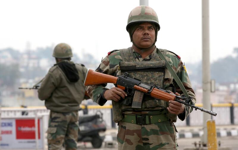 epa07376506 Indian army soldiers stand guard during curfew continues for the third day in Jammu, the winter capital of Kashmir, India, 17 February 2019. A curfew was imposed in parts of Jammu city following massive protests over the terror attack in Pulwama, according to the news reports more than 50 vehicles have been vandalised and eight vehicles set ablaze by the angry mob. At least 44 Indian paramilitary Central Reserve Police Force personnel were killed and several injured when a Jaish-e-Mohammed militant rammed an explosive-laden vehicle into a CRPF convoy along Srinagar-Jammu highway at Lethpora area in south Kashmir's Pulwama district on 14 February 2019, according local media reports.  EPA/JAIPAL SINGH