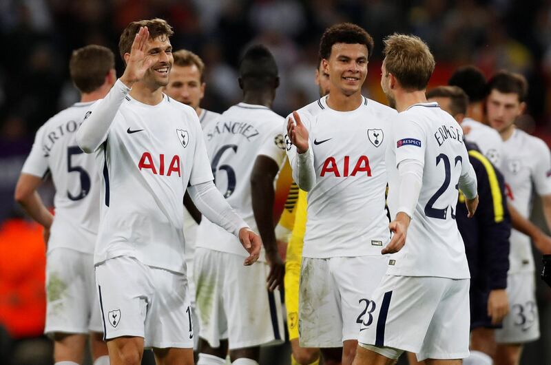 Tottenham players celebrate after the match. Paul Childs / Reuters