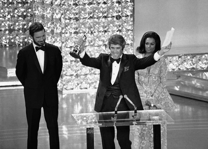 Bacharach accepts the Oscar for Best Original Score for Butch Cassidy and the Sundance Kid at the Academy Awards in Los Angeles on April 7, 1970. AP
