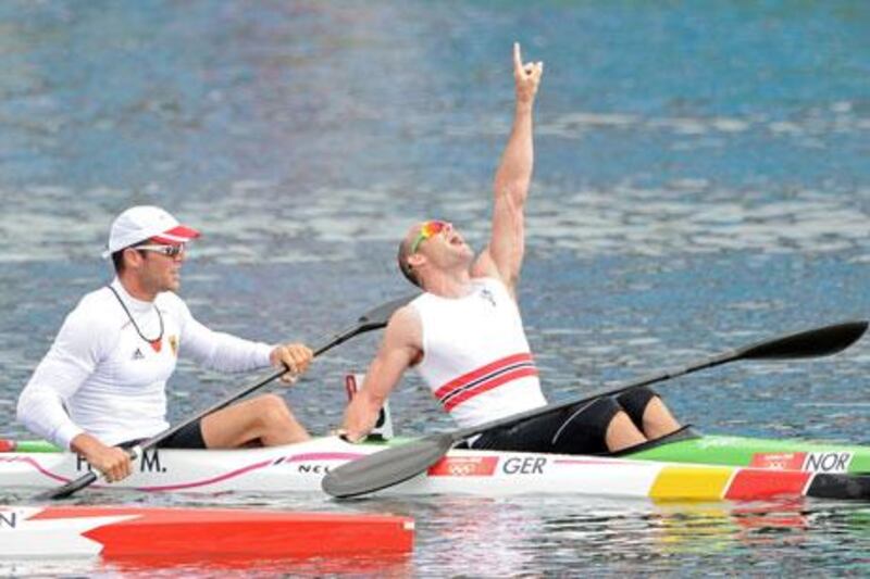 Norway's Eirik Veras Larsen celebrates his victory in the Olympic men's kayak sprint.