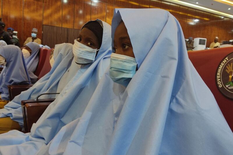 A group of girls previously kidnapped from their boarding school in northern Nigeria are seen at the Government House in Gusau, Zamfara State upon their release. AFP