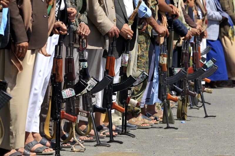epa07052006 Supporters of Houthi rebels hold weapons during a gathering to mobilize more tribal fighters into the intensifying battlefront of Hodeidah, in Sana'a, Yemen, 27 September 2018. According to reports, UN investigators have called for continued inquiry into alleged violations in Yemen's ongoing conflict, after their recent report accused both warring parties, especially Saudi-backed government forces and the Houthi rebels, of violations against international law, including disproportionate attacks on civilians, arbitrary and abusive detention and recruitment of children.  EPA/YAHYA ARHAB
