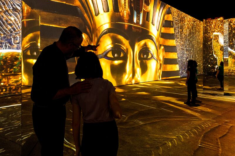 The experience takes visitors on a journey flooded with sights, sounds and intrigue through the world of King Tut. Photo: National Geographic 