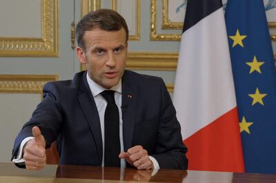 French President Emmanuel Macron gives an interview at the Elysee Palace in Paris on March 23, 2021 to the show "C Dans l'Air" on the French tv channel France 5 ahead of the broadcast of a documentary on France's diplomatic relations with Turkey.  / AFP / France 5 / -
