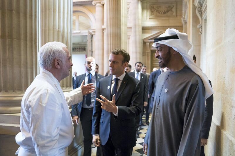 PARIS, FRANCE -November 21, 2018: HH Sheikh Mohamed bin Zayed Al Nahyan, Crown Prince of Abu Dhabi and Deputy Supreme Commander of the UAE Armed Forces (R) is received by HE Emmanuel Macron, President of France (C), commencing a business visit.

( Mohamed Al Hammadi / Ministry of Presidential Affairs )
---