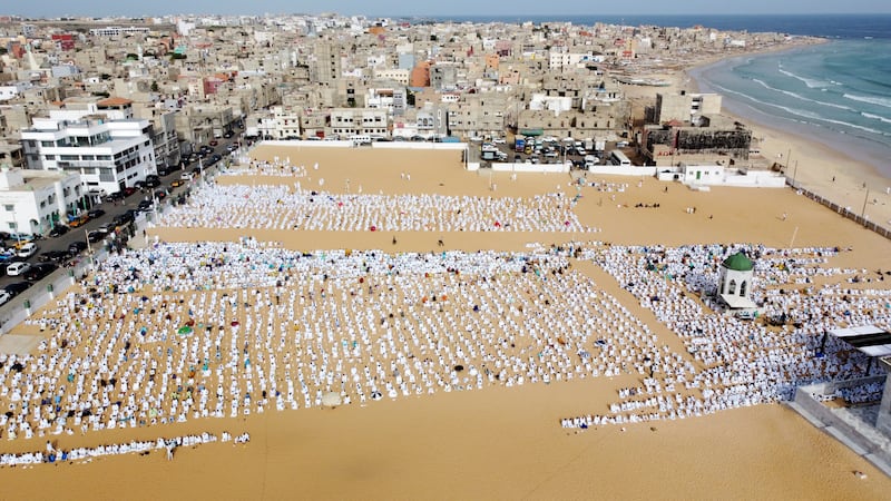 Senegalese Muslims attend Eid Al Adha prayers as Covid-19 cases surge in Dakar, Senegal.