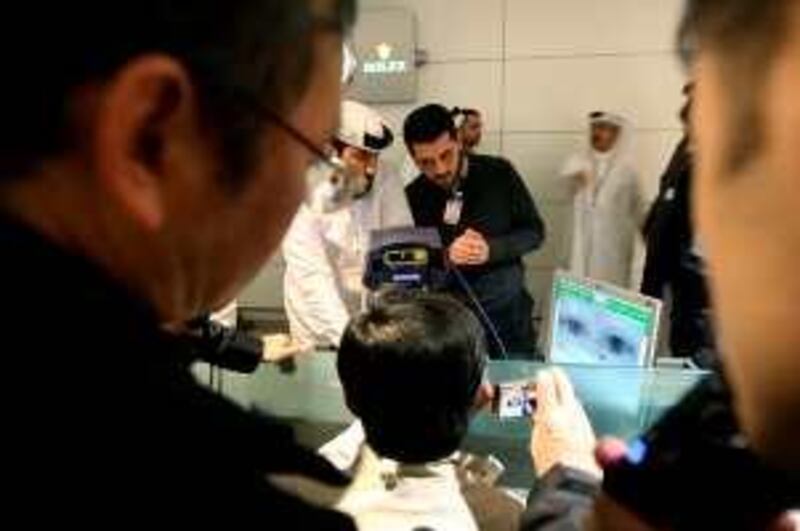 DUBAI, UNITED ARAB EMIRATES Ð Jan 15: DNRD officials explaining about eye scan technology to the International delegation at Dubai International Airport Terminal 3 in Dubai. (Pawan Singh / The National) Story by Eugene *** Local Caption ***  PS07- DUBAI AIRPORT.jpg