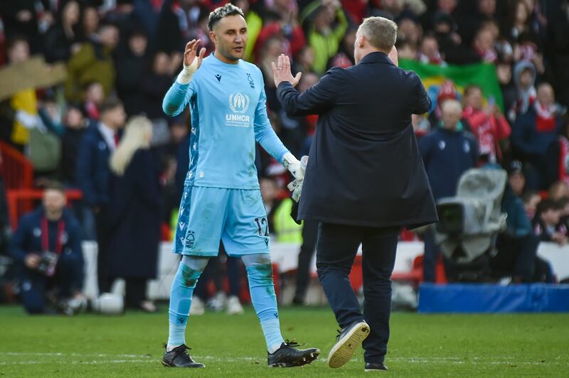 Nottingham Forest's goalkeeper Keylor Navas and manager Steve Cooper after the win. AP 