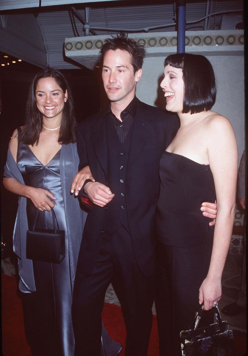 03/24/99. Westwood, CA. Keanu Reeves with dates arrives at the world premiere showing of the new film "The Matrix" at the Mann's Village Theatre. Photo Brenda Chase/Online USA, Inc./Getty Images