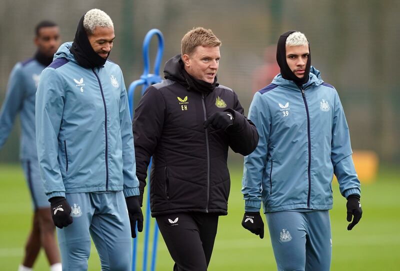 Newcastle United manager Eddie Howe alongside Brazilian duo Bruno Guimaraes, right, and Joelinton during training ahead of their Champions League clash with AC Milan. PA