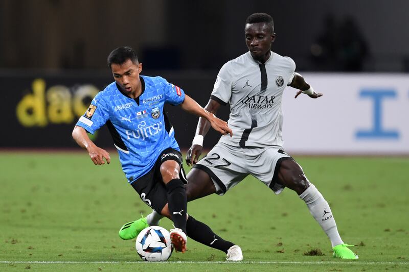 Chanathip Songkrasin of Kawasaki Frontale under pressure from PSG midfielder Idrissa Gueye. Getty