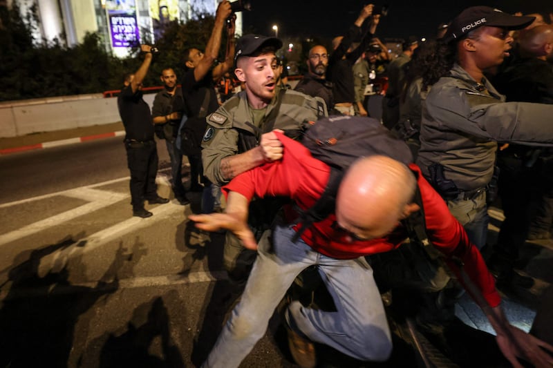 Israeli police used force to disperse anti-government protesters. AFP