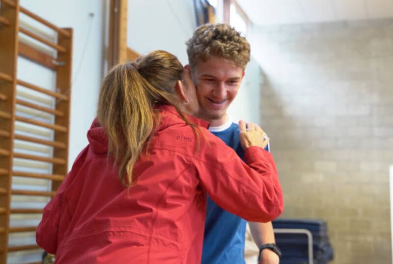 Well done. A pupil at Fowey River Academy, Cornwall, receives his GCSE results.