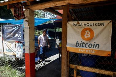 Bitcoin banners are seen outside of a small restaurant at El Zonte Beach in Chiltiupan, El Salvador. Reuters