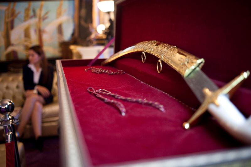 Dubai, United Arab Emirates - January 15 2012 - A 500 year old sword with sod gold sheath is on display at the World Luxury Expo in Burj Al Arab. It is worth one million USD.  (Razan Alzayani / The National)