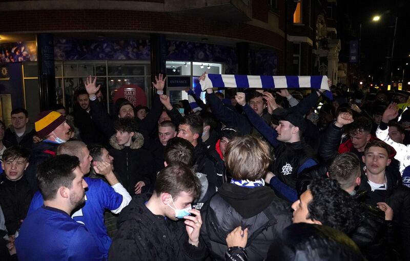 Chelsea fans celebrate outside their Stamford Bridge ground after beating Real Madrid 2-0 in their semi-final second leg and make the Champions League final where they will take on Manchester City. PA