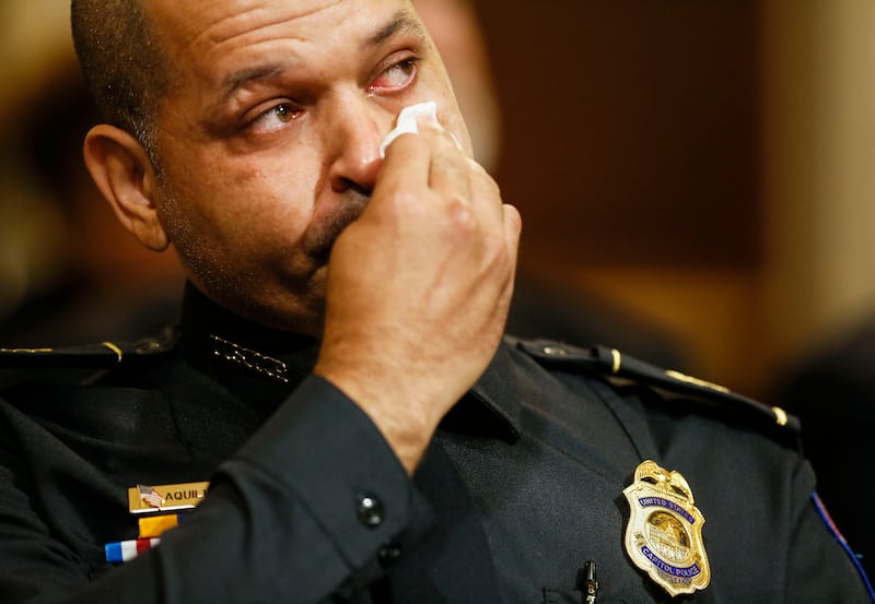 US Capitol Police Sergeant Aquilino Gonell watches a video of the January 6, 2021 attack. AFP