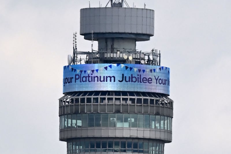 The BT tower in central London bears a message to Queen Elizabeth II. AFP