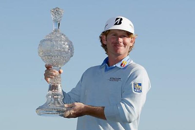 Brandt Snedeker poses with the trophy after winning the AT&T Pebble Beach National Pro-Am.