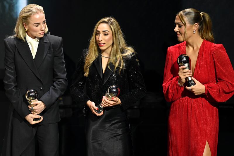 Alex Greenwood, Olga Carmona and Mary Earps, with their awards after being named in the the Fifpro Women's World XI. Getty