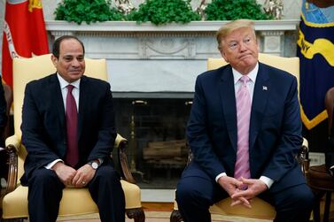 US President Donald Trump  with Egyptian President Abdel Fattah El Sisi in the Oval Office in April. Mr Trump has offered to intervene to break the deadlock with Ethiopia over its construction of a massive upstream Nile dam. Evan Vucci / AP