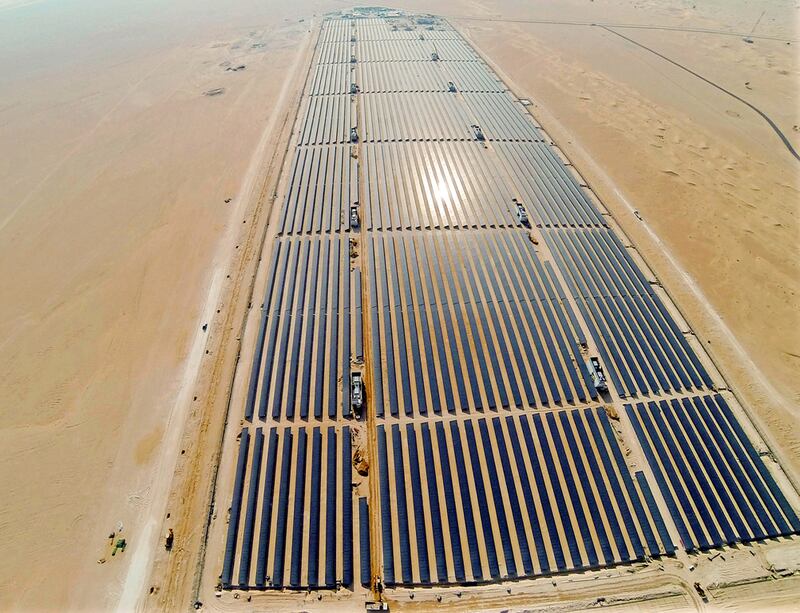 A solar park in Dubai. The emirate aims to raise the share of renewables in its energy mix to 13 per cent before the end of the year. Photo: Dewa