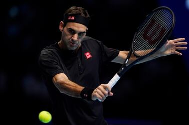 Roger Federer defeated Novak Djokovic during a round robin match at the ATP World Tour Finals in London. EPA