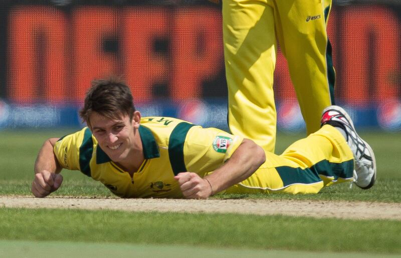 Australia's Mitchell Marsh reacts after going to ground in an attempt to take the wicket of England's Ian Bell caught and bowled during the ICC Champions Trophy group A cricket match between England and Australia at Edgbaston cricket ground in Birmingham, England, Saturday, June 8, 2013. (AP Photo/Matt Dunham) *** Local Caption ***  Britain ICC Trophy England Australia Cricket.JPEG-03eee.jpg