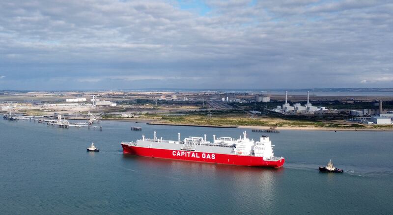 A ship carrying liquefied natural gas arrives at the Isle of Grain terminal in Kent, the UK. PA