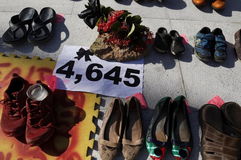 Shoes are displayed at the Capitol to pay tribute to Hurricane Maria's victims in San Juan, Puerto Rico. Alvin Baez / Reuters