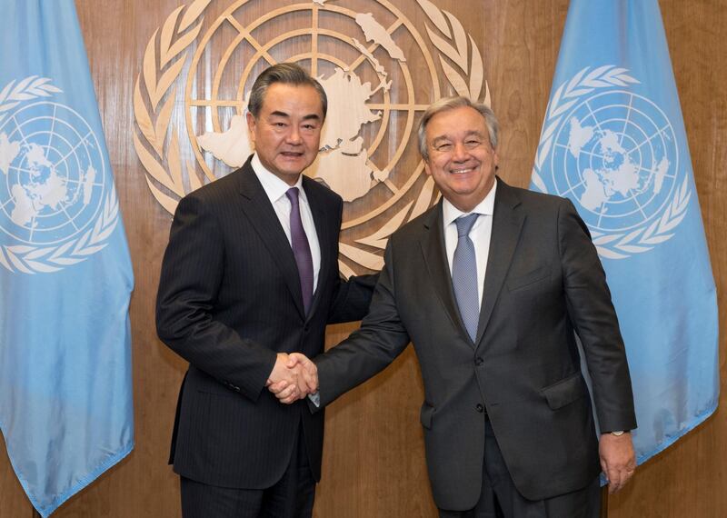 Wang Yi, left, State Councillor and Minister for Foreign Affairs, People's Republic of China, is greeted by U.N. Secretary General Antonio Guterres. The United Nations via AP