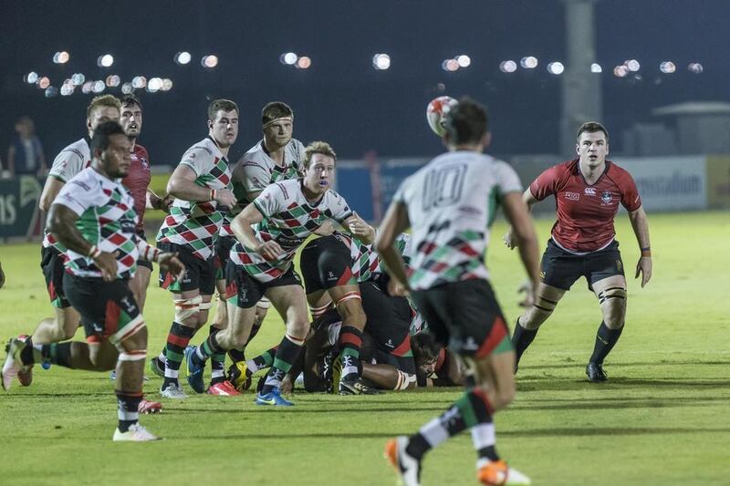 Abu Dhabi Harlequins, in white, in action against Dubai Exiles on Friday night. Antonie Robertson / The National / September 2, 2016