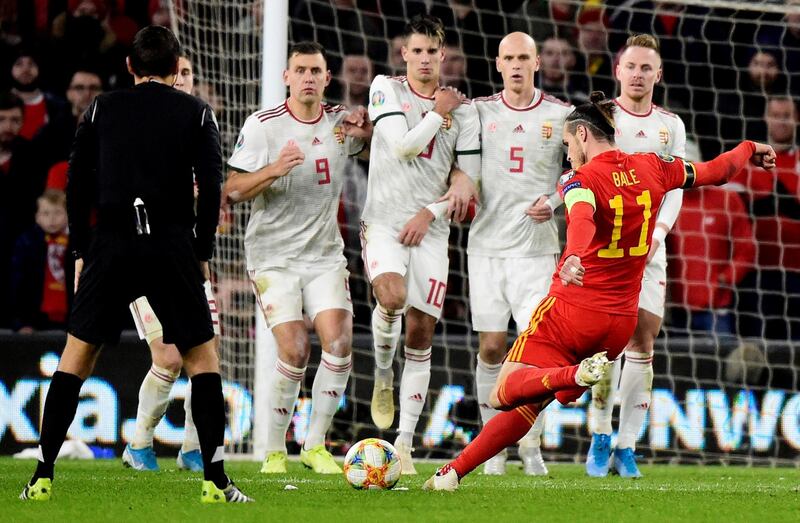 Wales attacker Gareth Bale goes for goal from a free-kick. Reuters