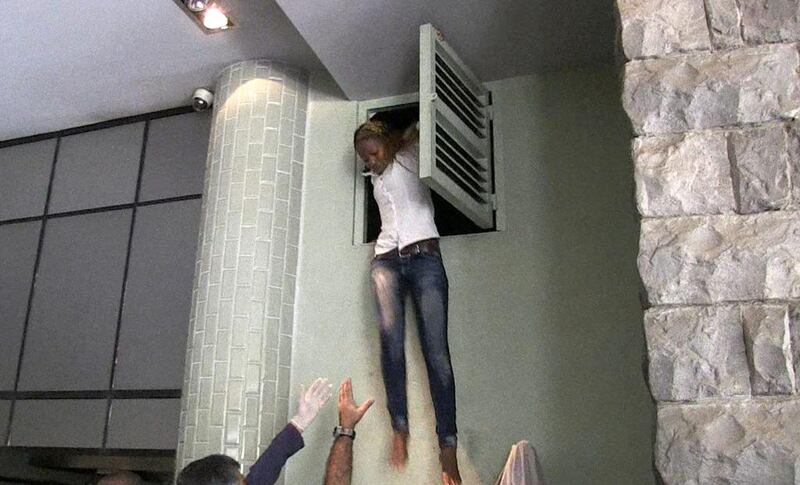 A woman hid in an air vent during the attack. AFP