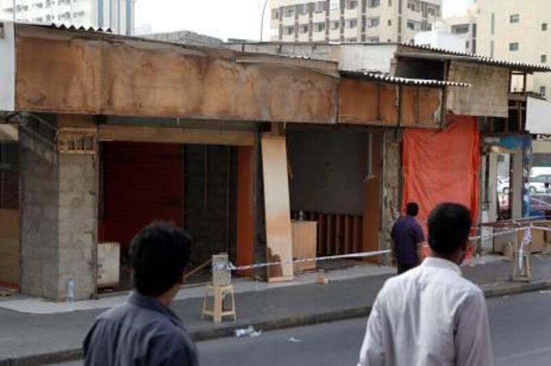 SHARJAH, UNITED ARAB EMIRATES, June 24, 2012.  Abandoned shops, in the Al Ghuwair market area near Rolla Square in Sharjah, that has been cordoned off by the police after a murder took place there. (ANTONIE ROBERTSON / The National )