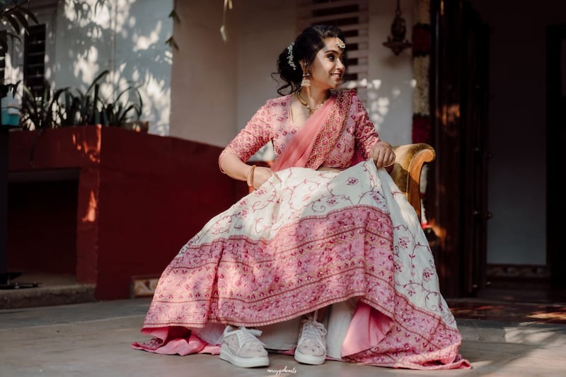 Many modern-age brides are styling their wedding saris with comfy trainers. Photo: Shruti Kasat / The Saree Sneakers